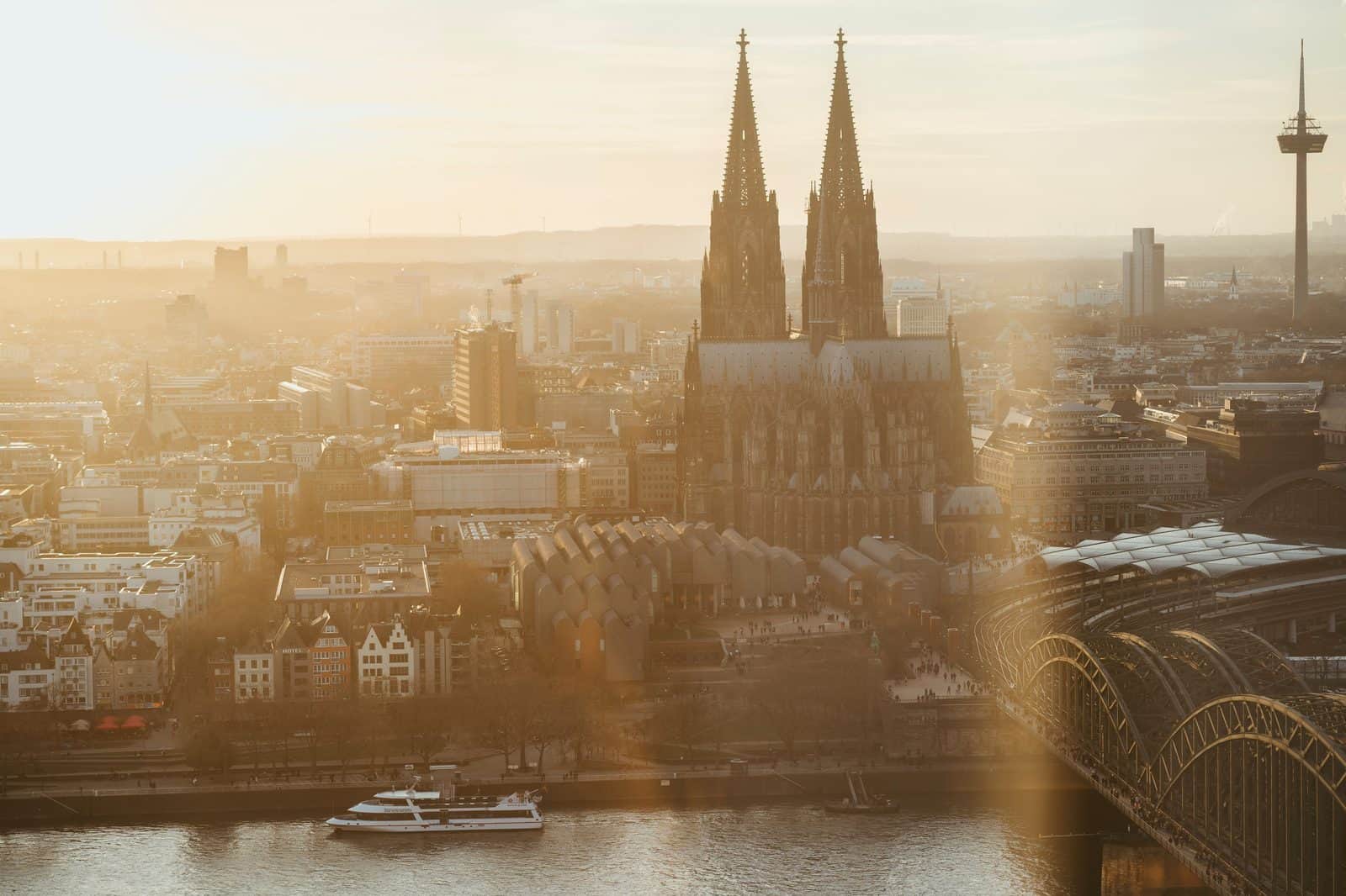 Cologne Cathedral and the Rhine at sunrise — corporate event activities in Cologne